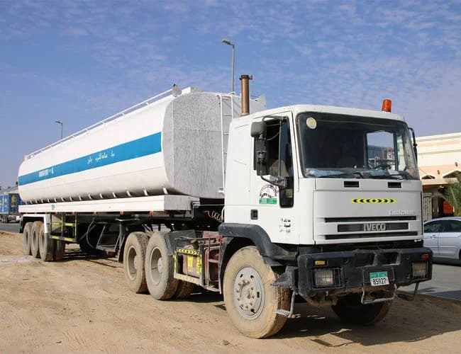 Water tanker and haulage trucks for site logistics across the UAE